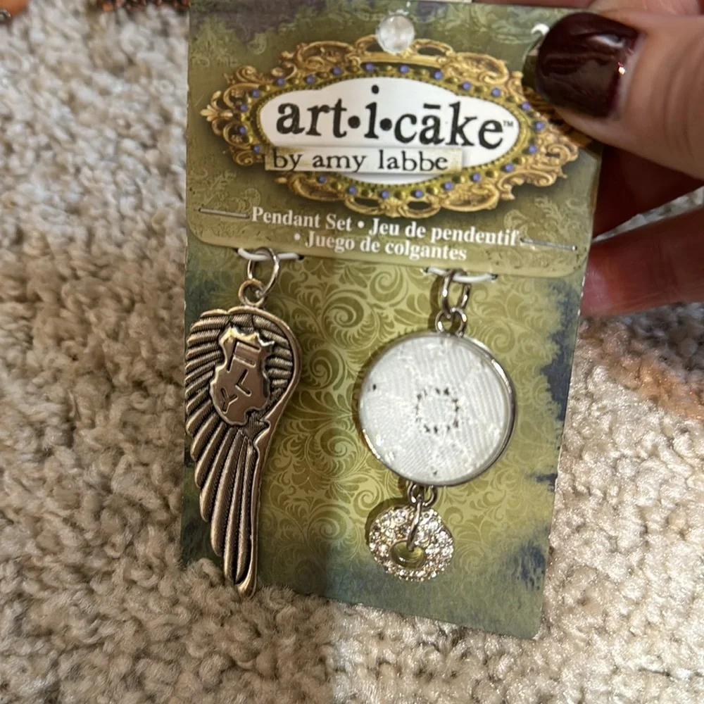 COPY - art i cake amy labbe wing (fly) and lace, pendant